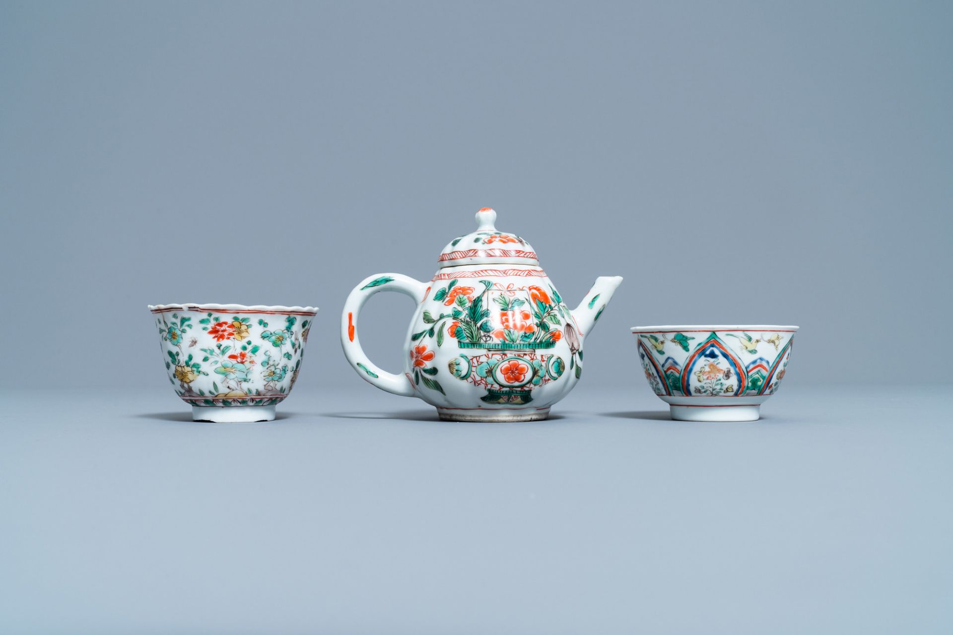 A Chinese famille verte teapot, two cups and three saucers, Kangxi - Image 5 of 10