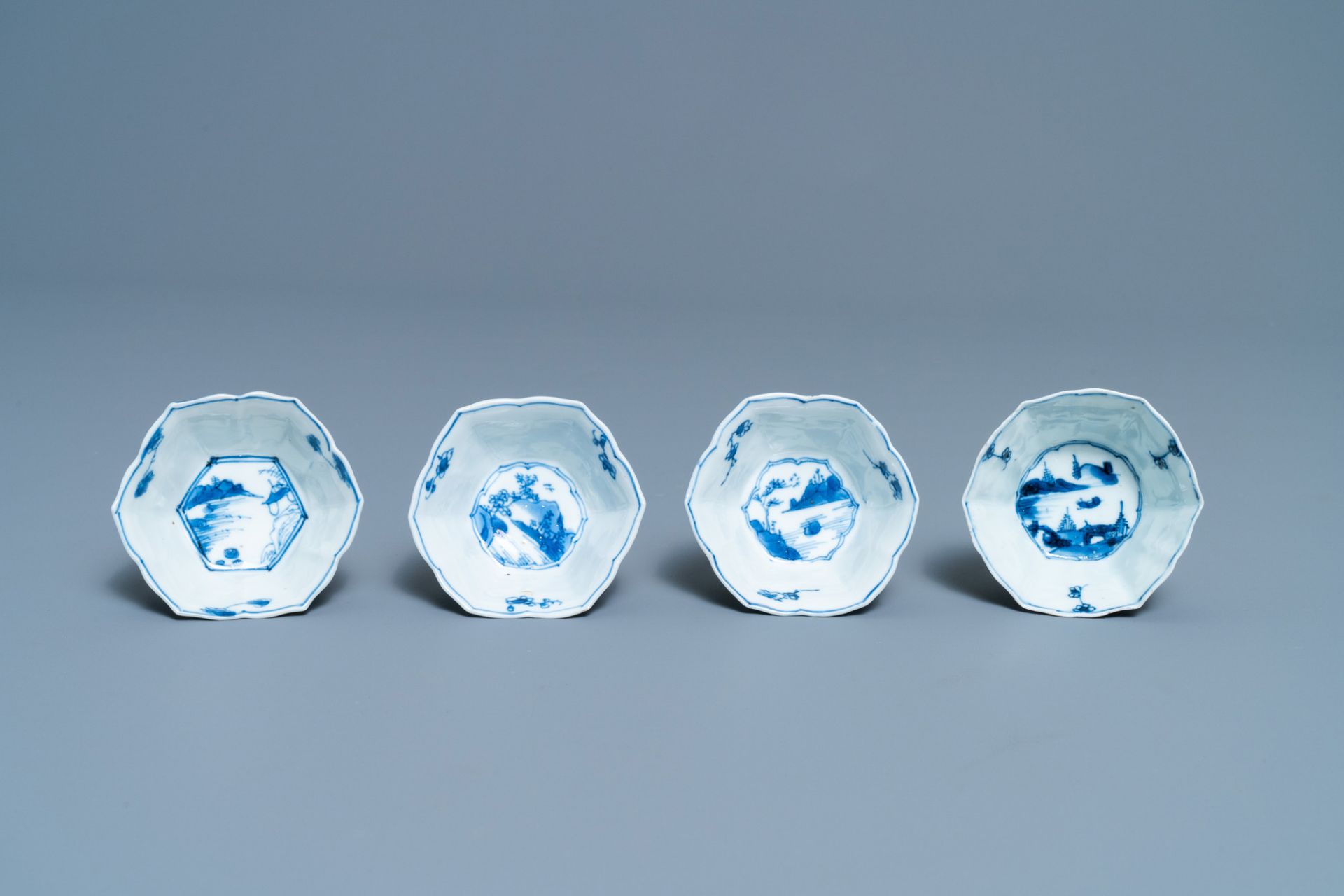 A pair of Chinese blue and white vases, a 'lotus' dish and four cups, Kangxi - Image 15 of 15