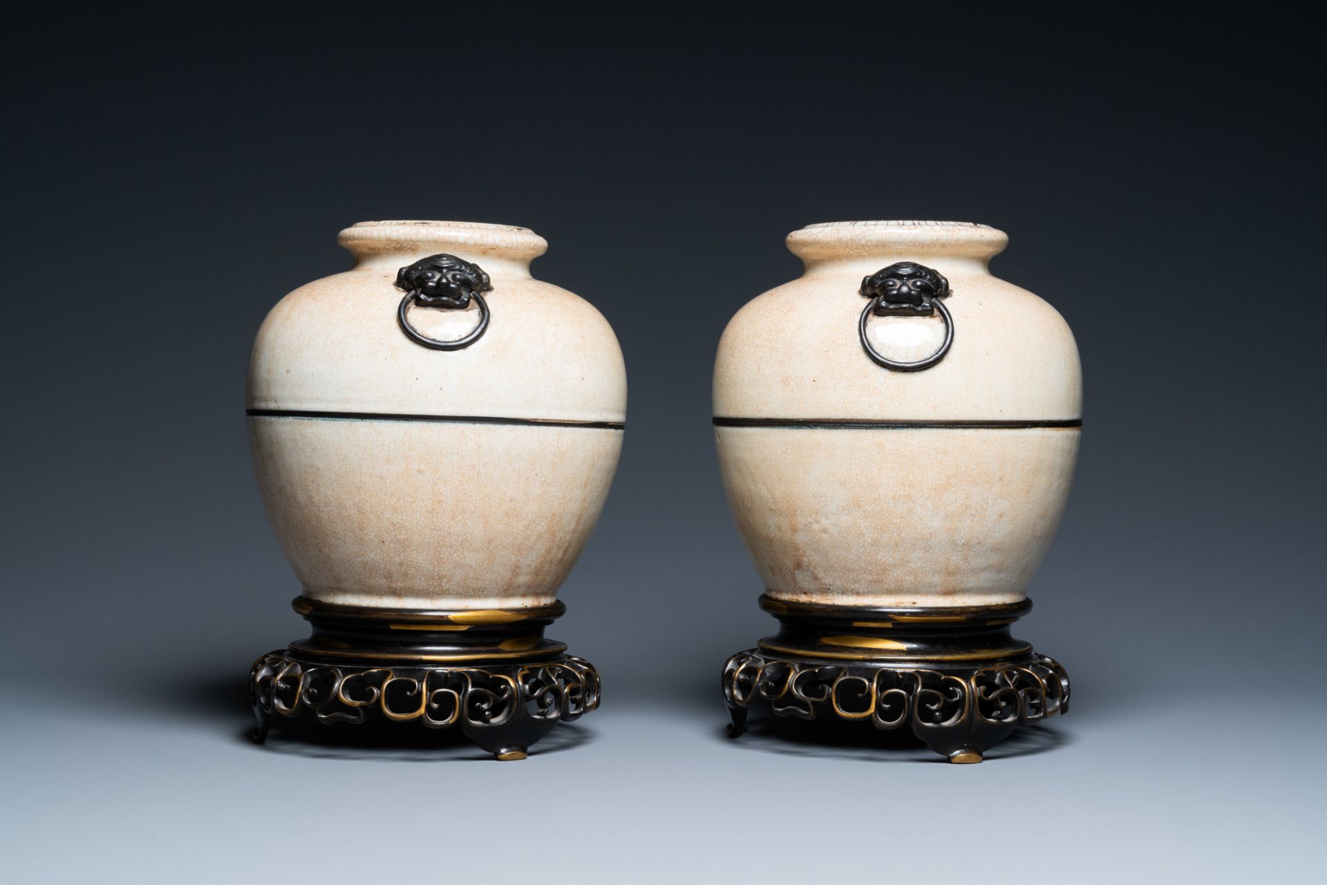 A pair of Chinese monochrome Nanking crackle-glazed vases on reticulated bronze stands, 19th C. - Image 4 of 6