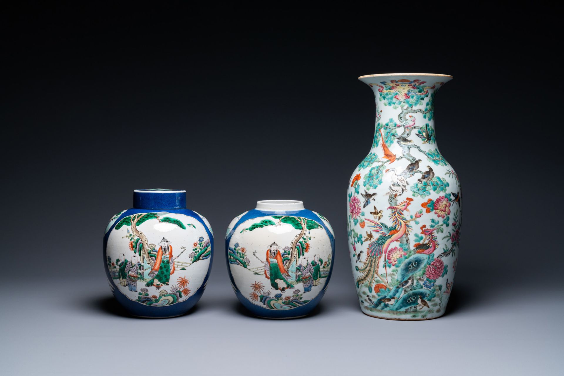 A Chinese famille rose vase and a pair of famille verte powder blue-ground jars, 19th C. - Image 2 of 7