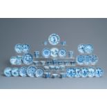 Twenty-one Chinese blue and white saucers and eighteen cups, Kangxi