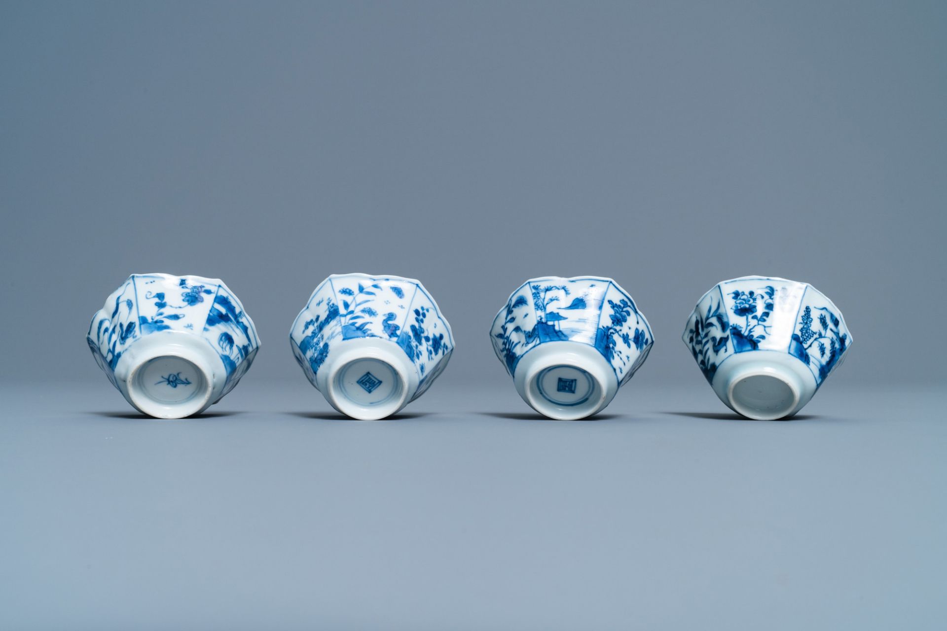 A pair of Chinese blue and white vases, a 'lotus' dish and four cups, Kangxi - Image 14 of 15