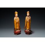 A pair of large Chinese or Vietnamese gilded, lacquered and painted wooden figures, 18/19th C.