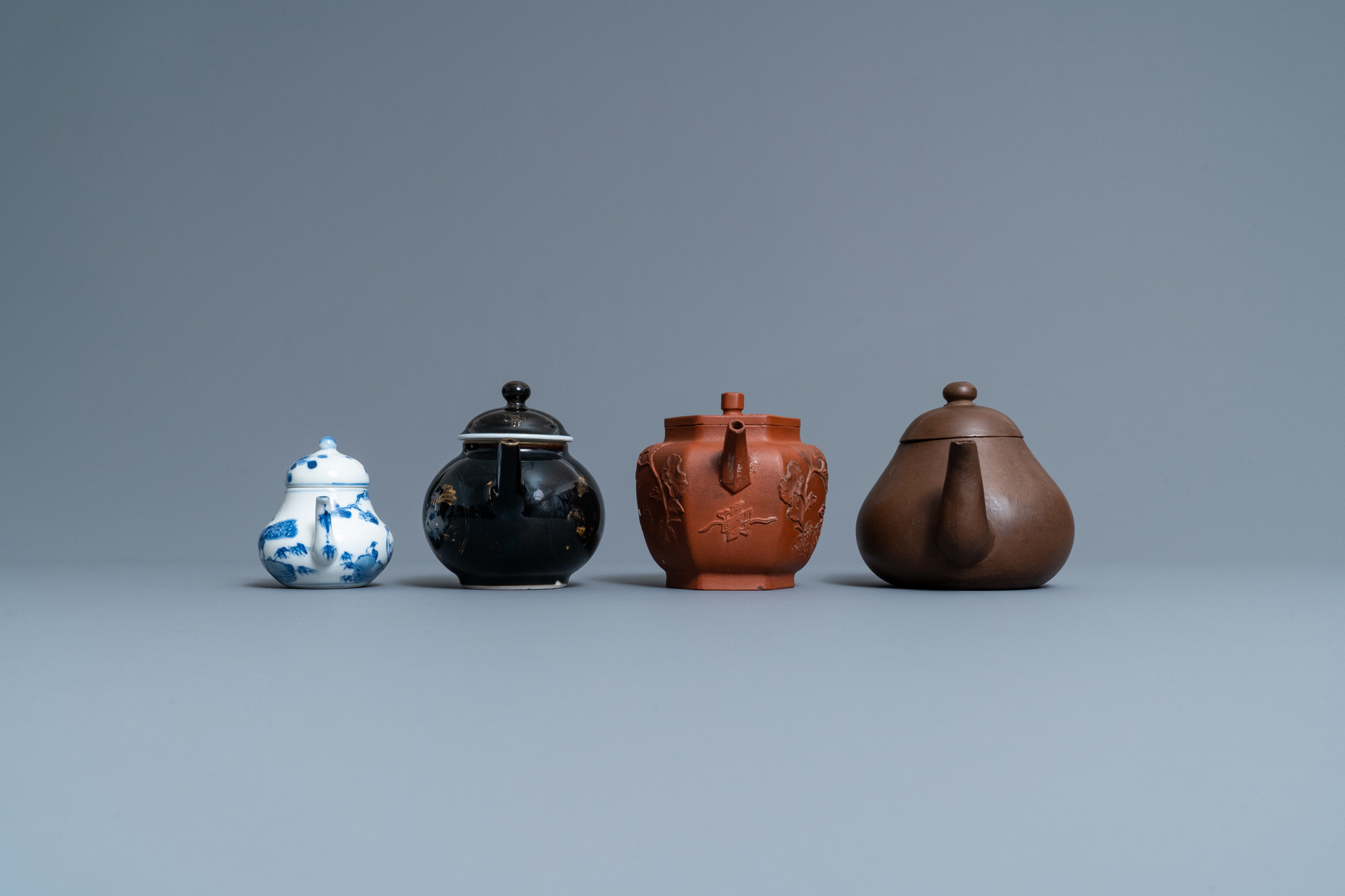 Four Chinese Yixing stoneware, blue and white and monochrome black porcelain teapots, Kangxi and lat - Image 3 of 9