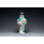 A Chinese famille verte 'battle scene' vase, 19th C.