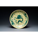 A Chinese yellow-ground famille verte 'dragon' dish, probably Qianlong