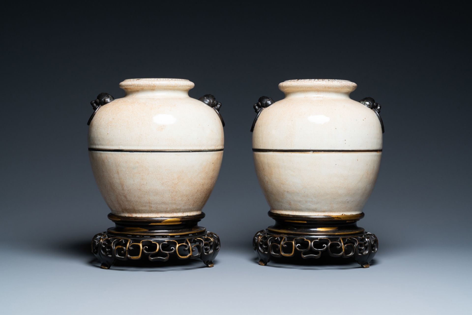 A pair of Chinese monochrome Nanking crackle-glazed vases on reticulated bronze stands, 19th C. - Image 3 of 6