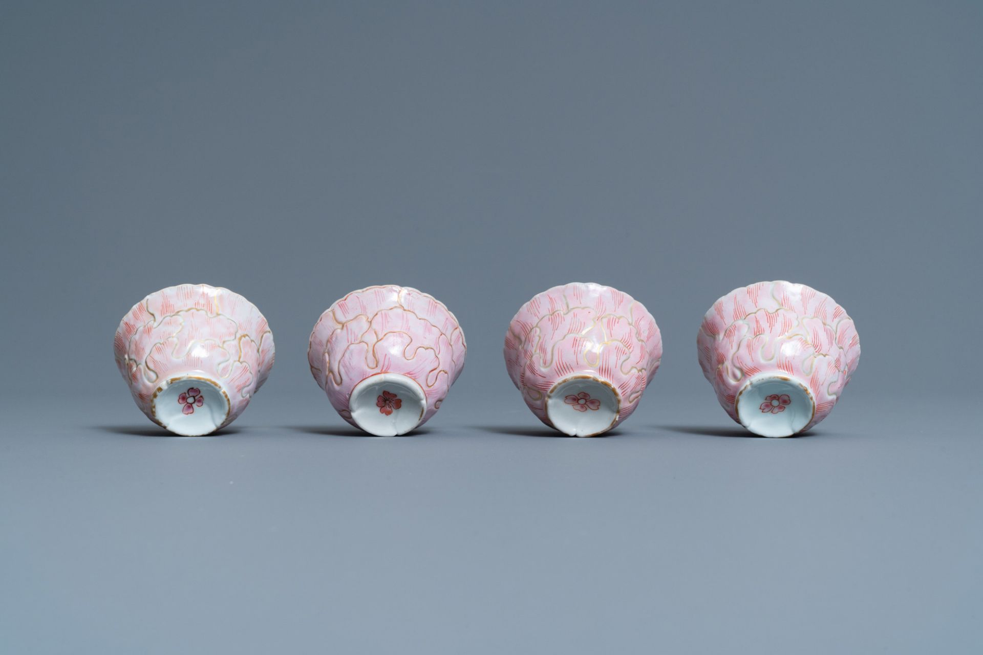 Four Chinese lotus-moulded famille rose cups and saucers with squirrels, Yongzheng - Image 9 of 9