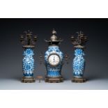 A Chinese bronze-mounted three-piece blue and white clock garniture, 19th C.