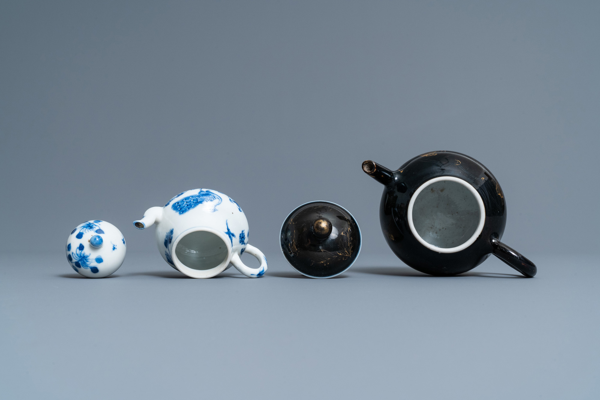 Four Chinese Yixing stoneware, blue and white and monochrome black porcelain teapots, Kangxi and lat - Image 8 of 9