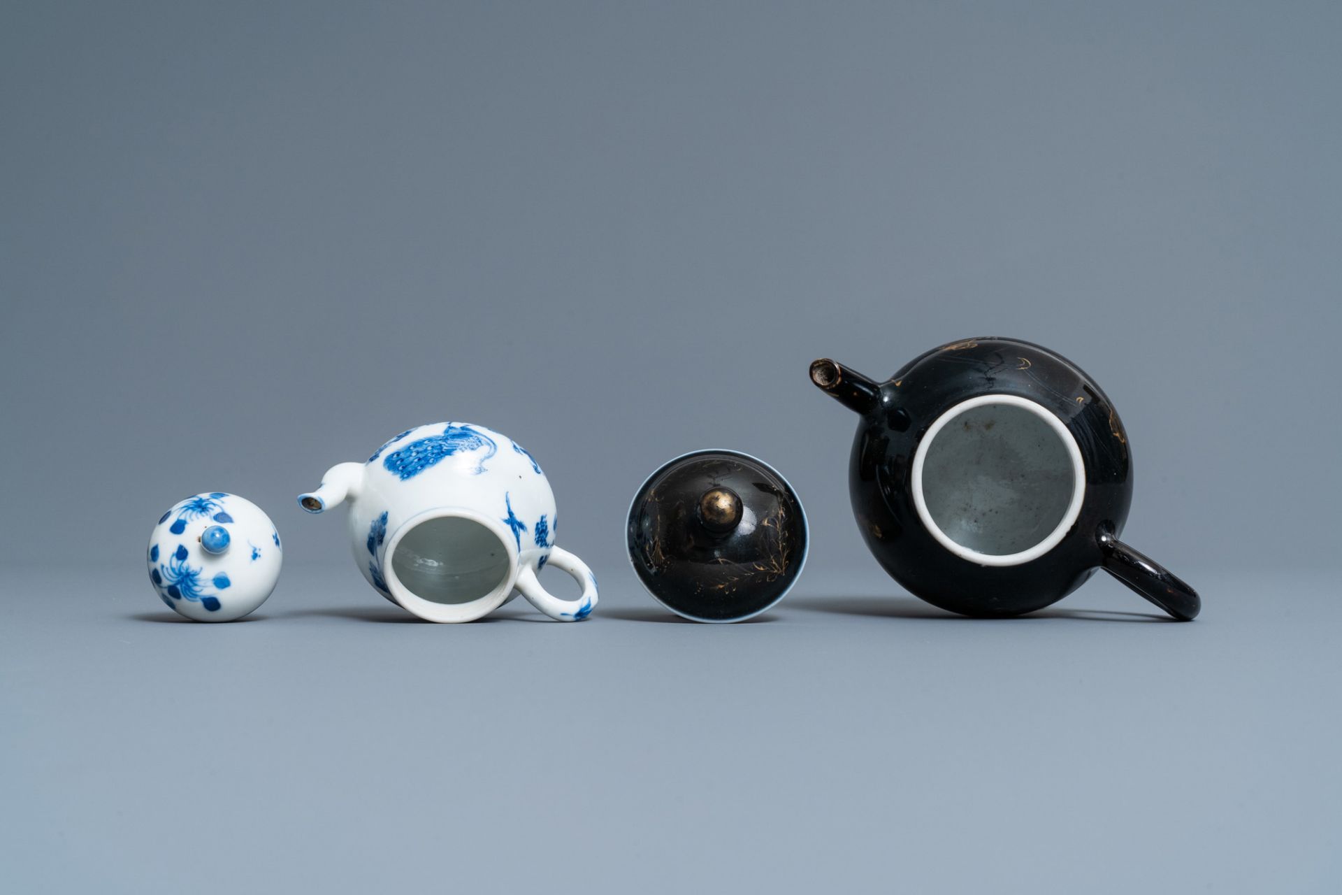 Four Chinese Yixing stoneware, blue and white and monochrome black porcelain teapots, Kangxi and lat - Image 8 of 9