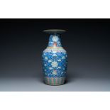 A Chinese famille rose blue-ground 'bajixiang' vase, 19th C.