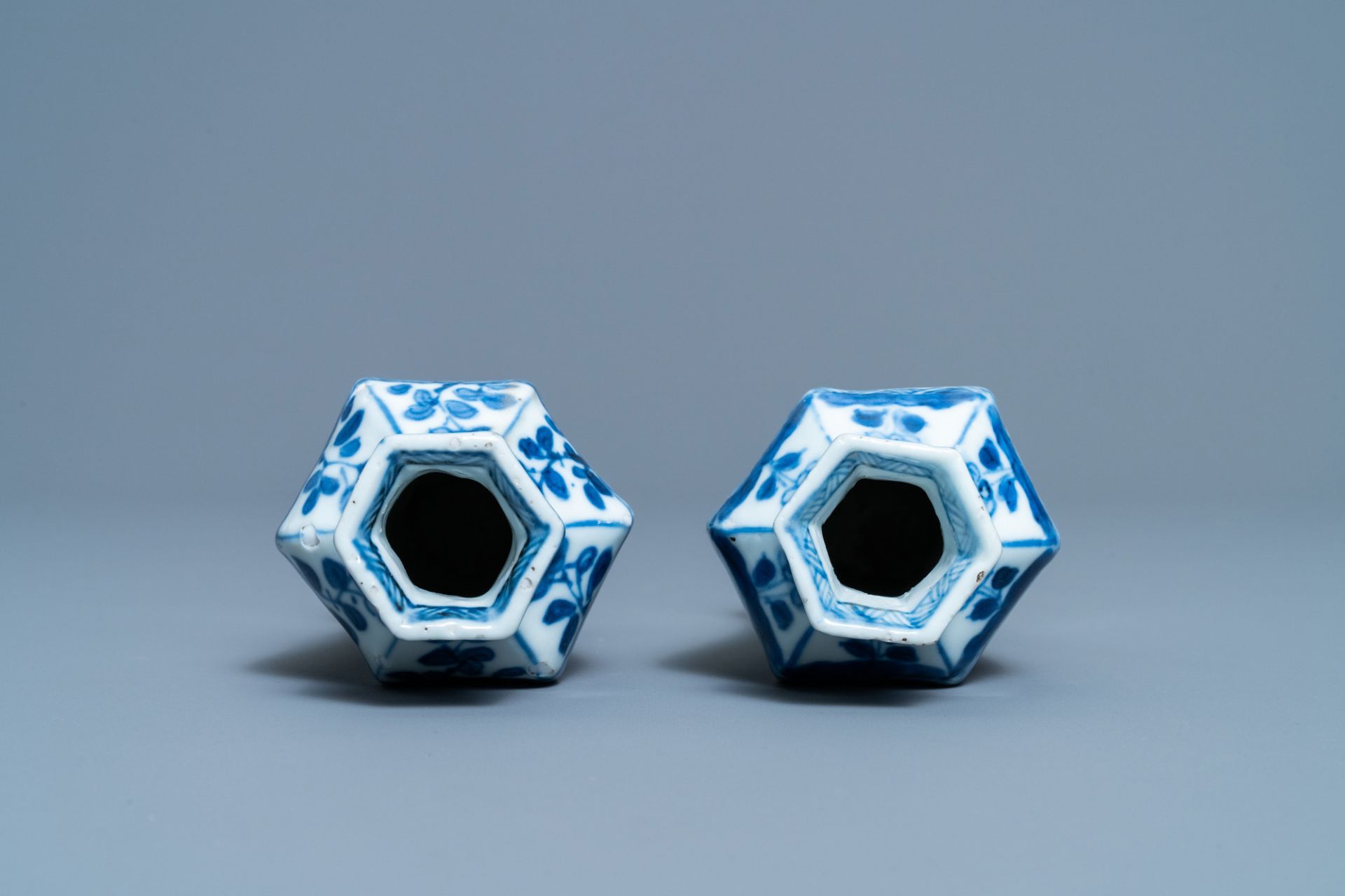 A pair of Chinese blue and white vases, a 'lotus' dish and four cups, Kangxi - Image 8 of 15