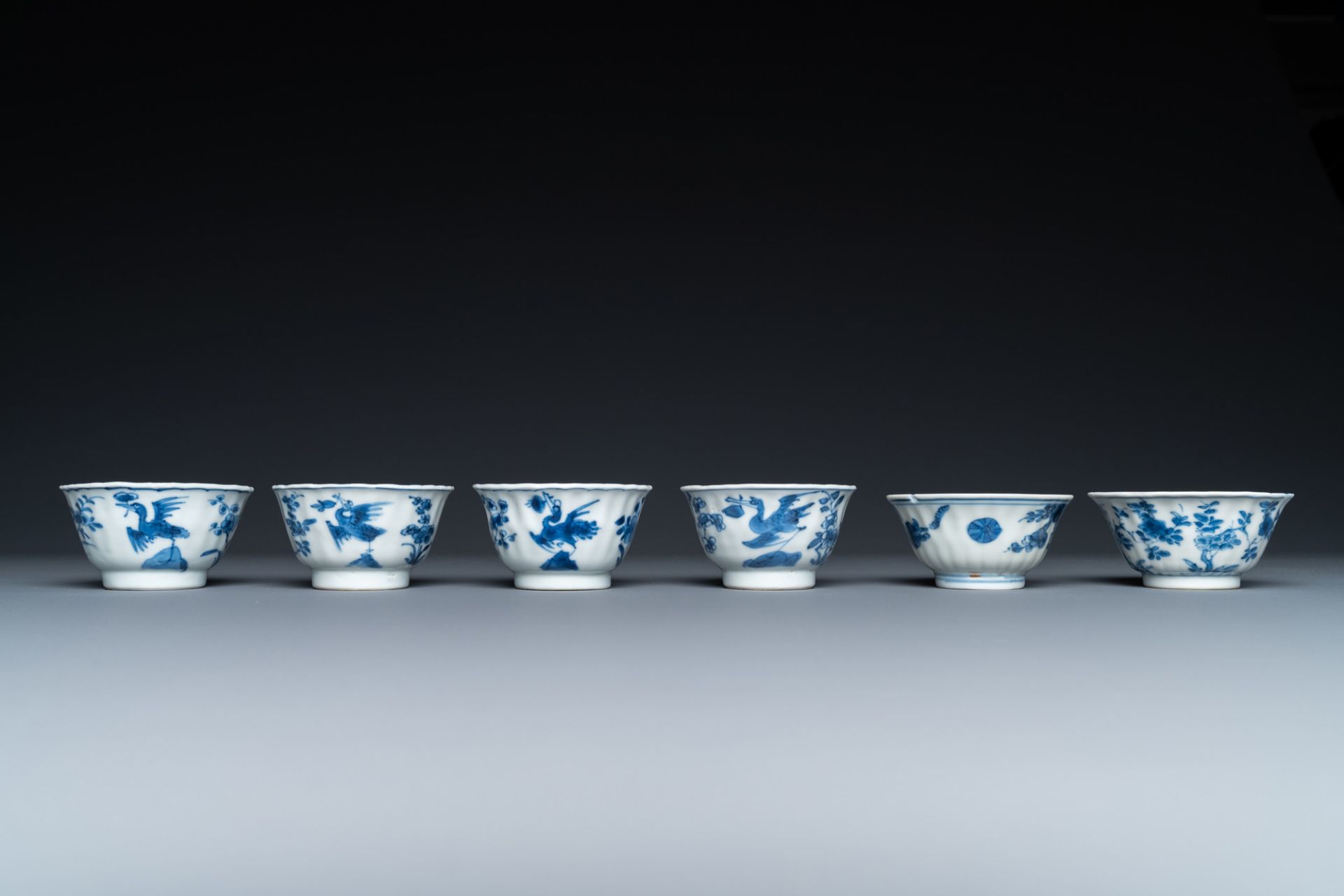 Twenty-three Chinese blue and white saucers and seventeen cups, Kangxi - Image 12 of 17