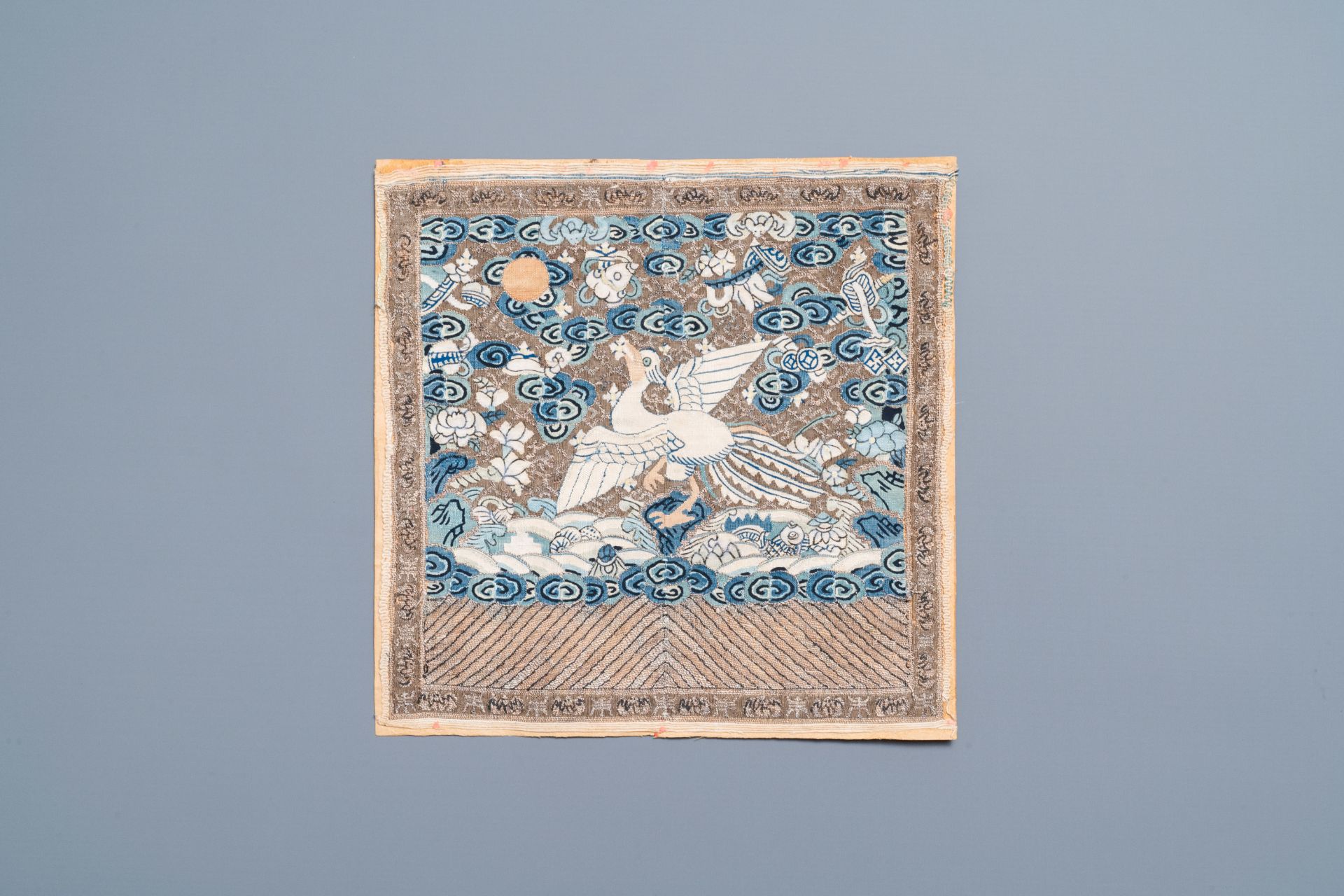 A Chinese 'kesi' embroidered rank badge with a silver pheasant, 18/19th C.