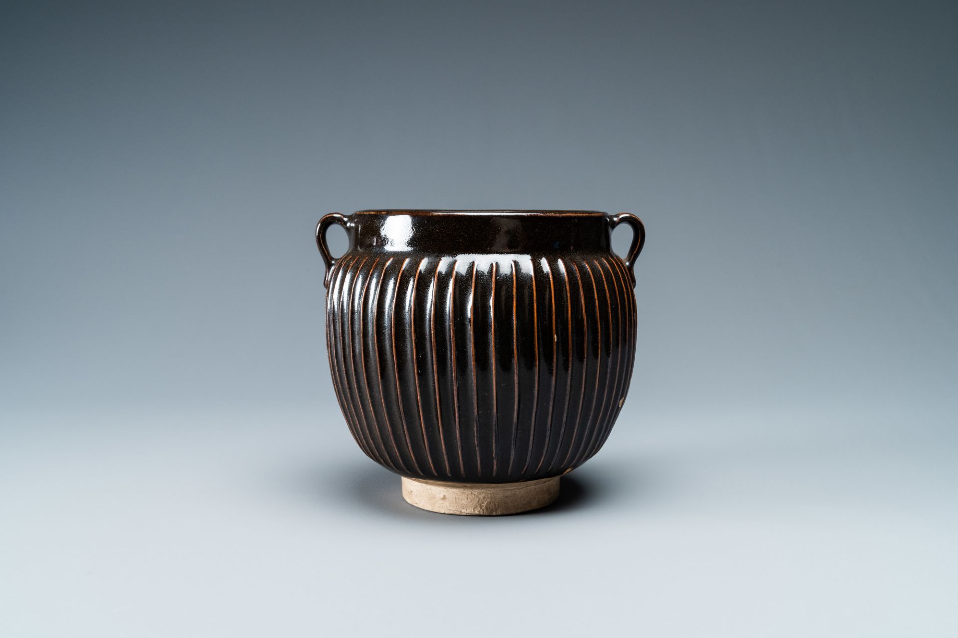 A Chinese black-glazed ribbed two-handled jar, Northern Song or Jin - Image 2 of 7