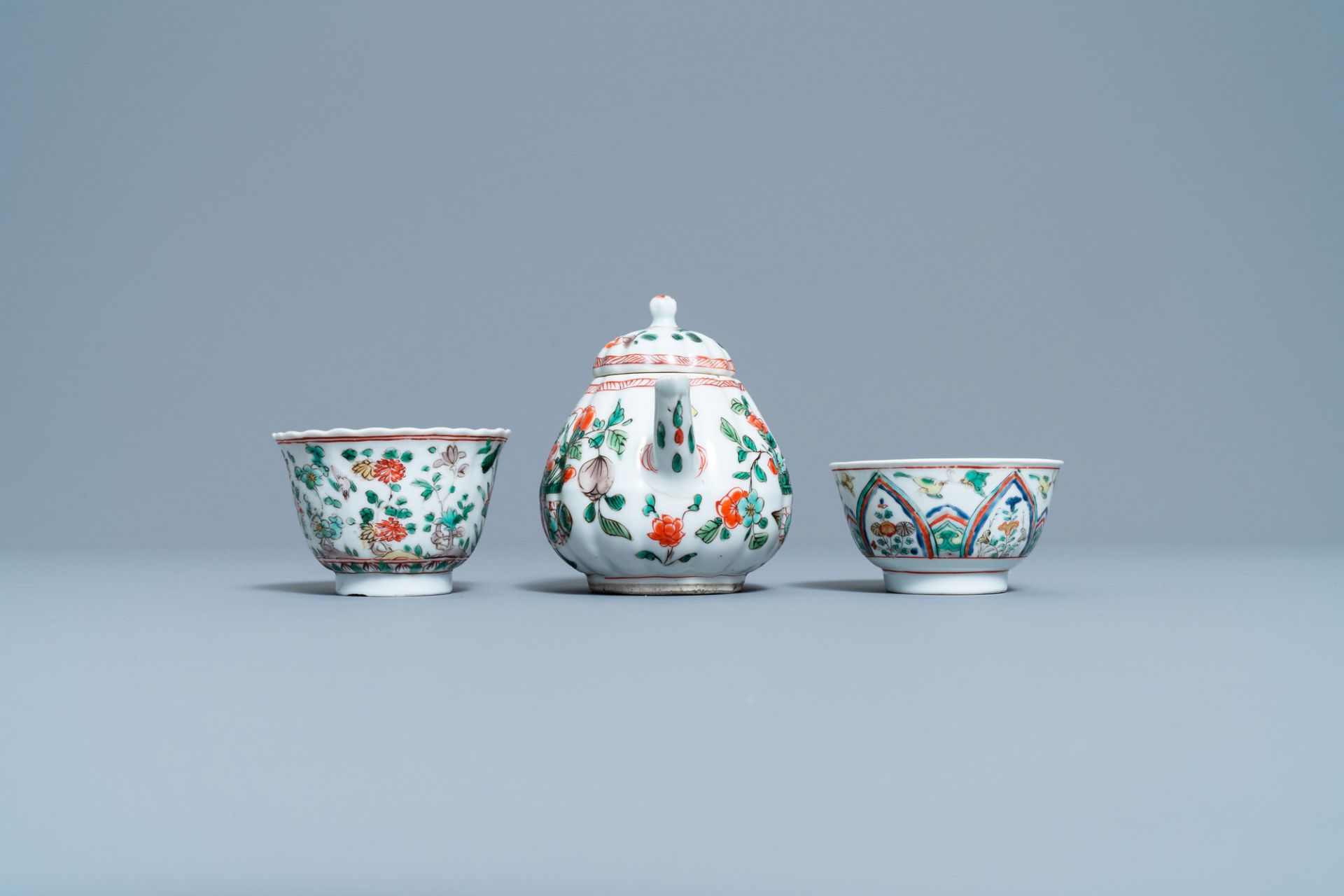 A Chinese famille verte teapot, two cups and three saucers, Kangxi - Image 6 of 10