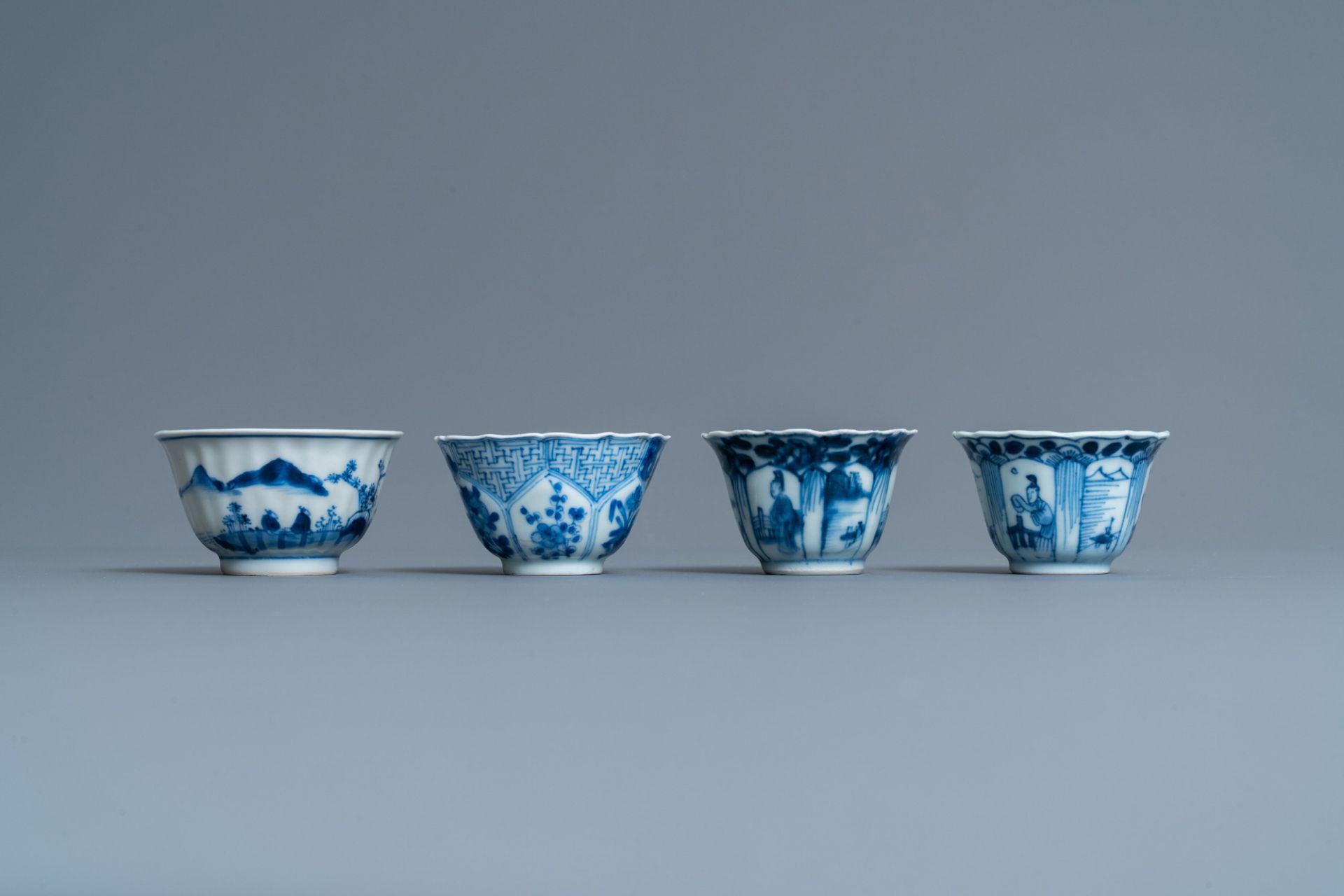 Twenty-one Chinese blue and white saucers and eighteen cups, Kangxi - Image 9 of 17