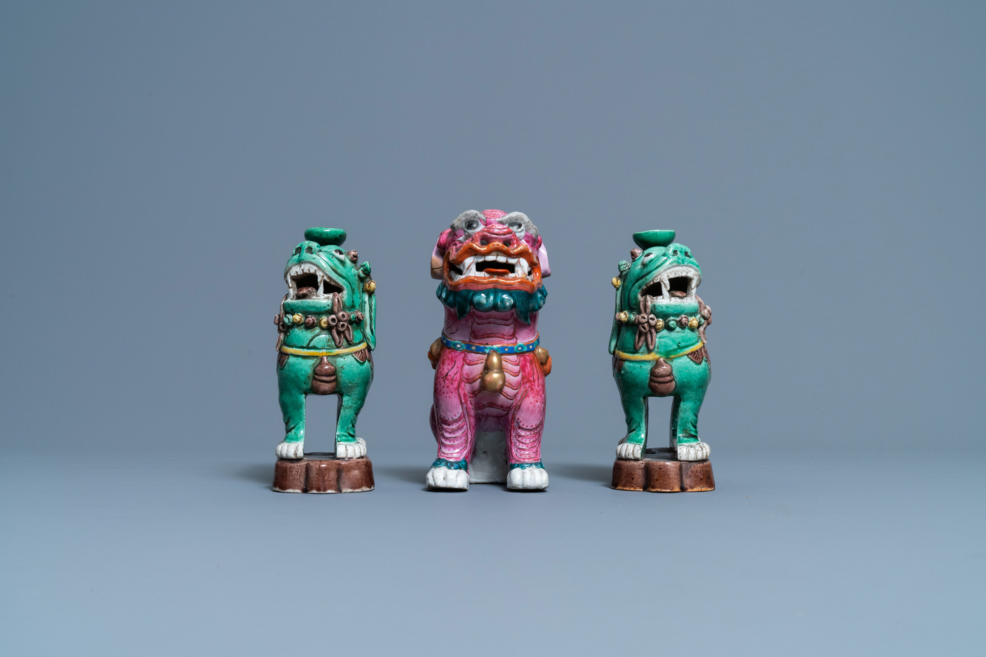 A Chinese famille rose model of a Buddhist lion and a pair of verte biscuit joss stick holders, 19th - Image 3 of 7