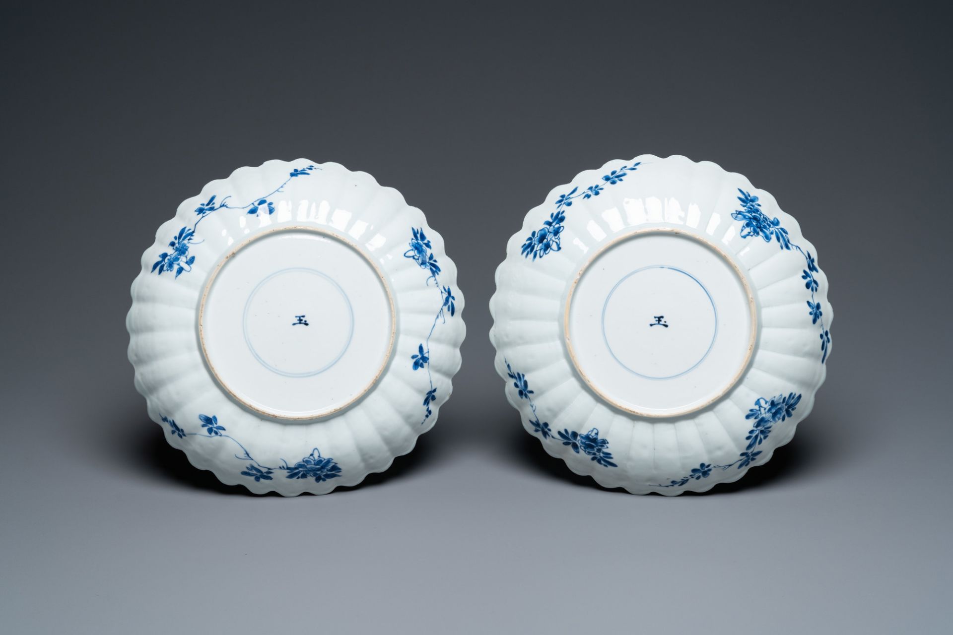 A pair of lobed Chinese blue and white dishes with butterflies, Kangxi - Image 2 of 2