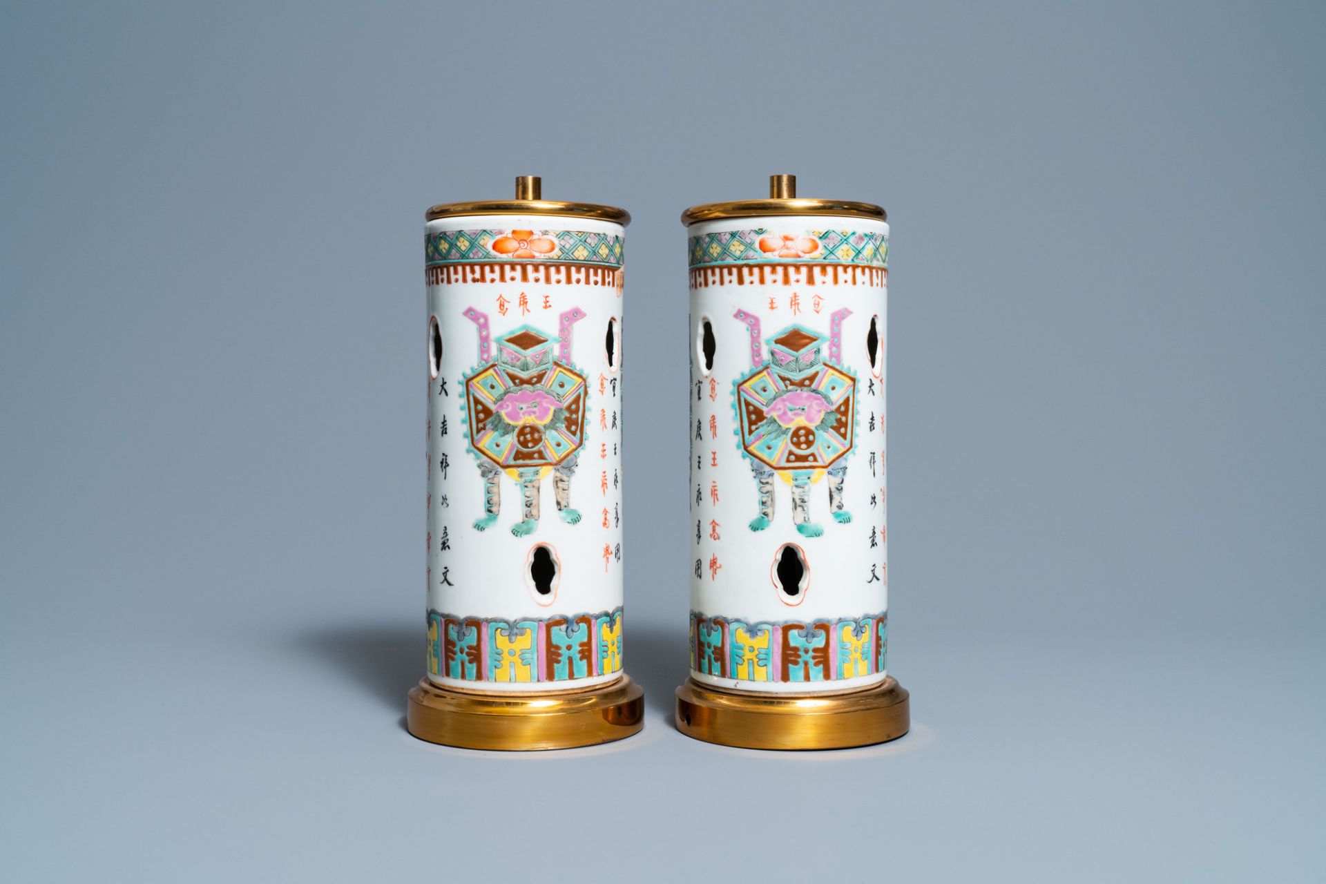 A pair of Chinese reticulated famille rose hat stands mounted as lamps, 19th C. - Image 2 of 7