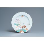 A Chinese famille rose dish with mandarin ducks near a lotus pond, Qianlong