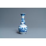 A Chinese blue and white triple gourd 'antiquities' vase, Kangxi