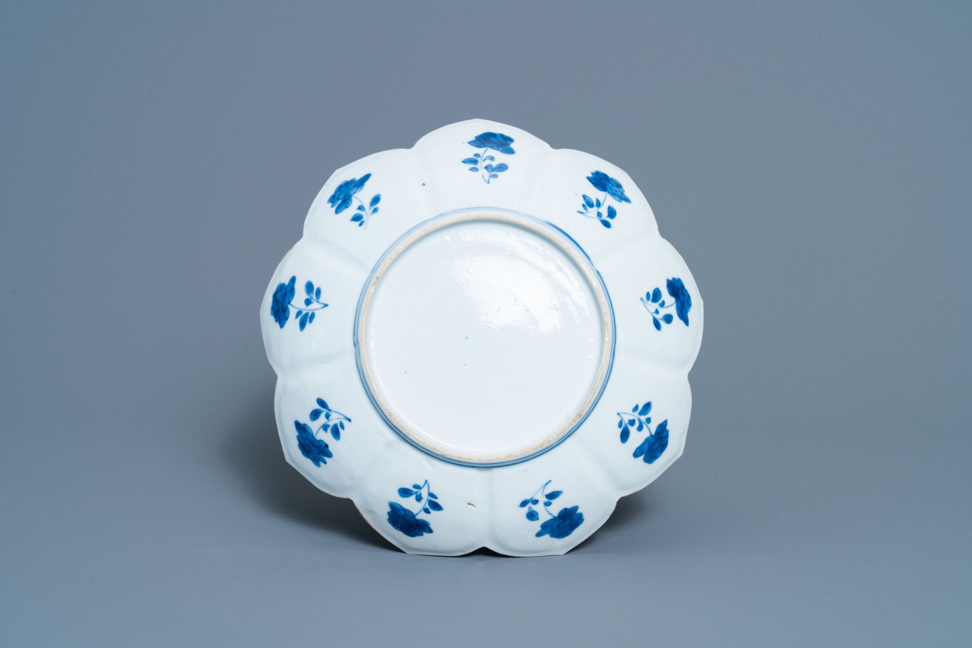 A pair of Chinese blue and white vases, a 'lotus' dish and four cups, Kangxi - Image 3 of 15