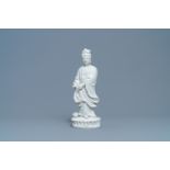 A Chinese Dehua blanc de Chine figure of Guanyin, Kangxi/Qianlong