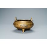 A Chinese bronze tripod 'elephants' censer, Qing