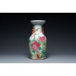 A Chinese qianjiang cai vase with birds among blossoms, 19th C.