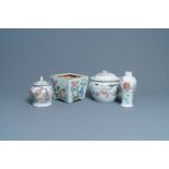 A Chinese famille rose jardiniere, two vases and a covered bowl, 19/20th C.