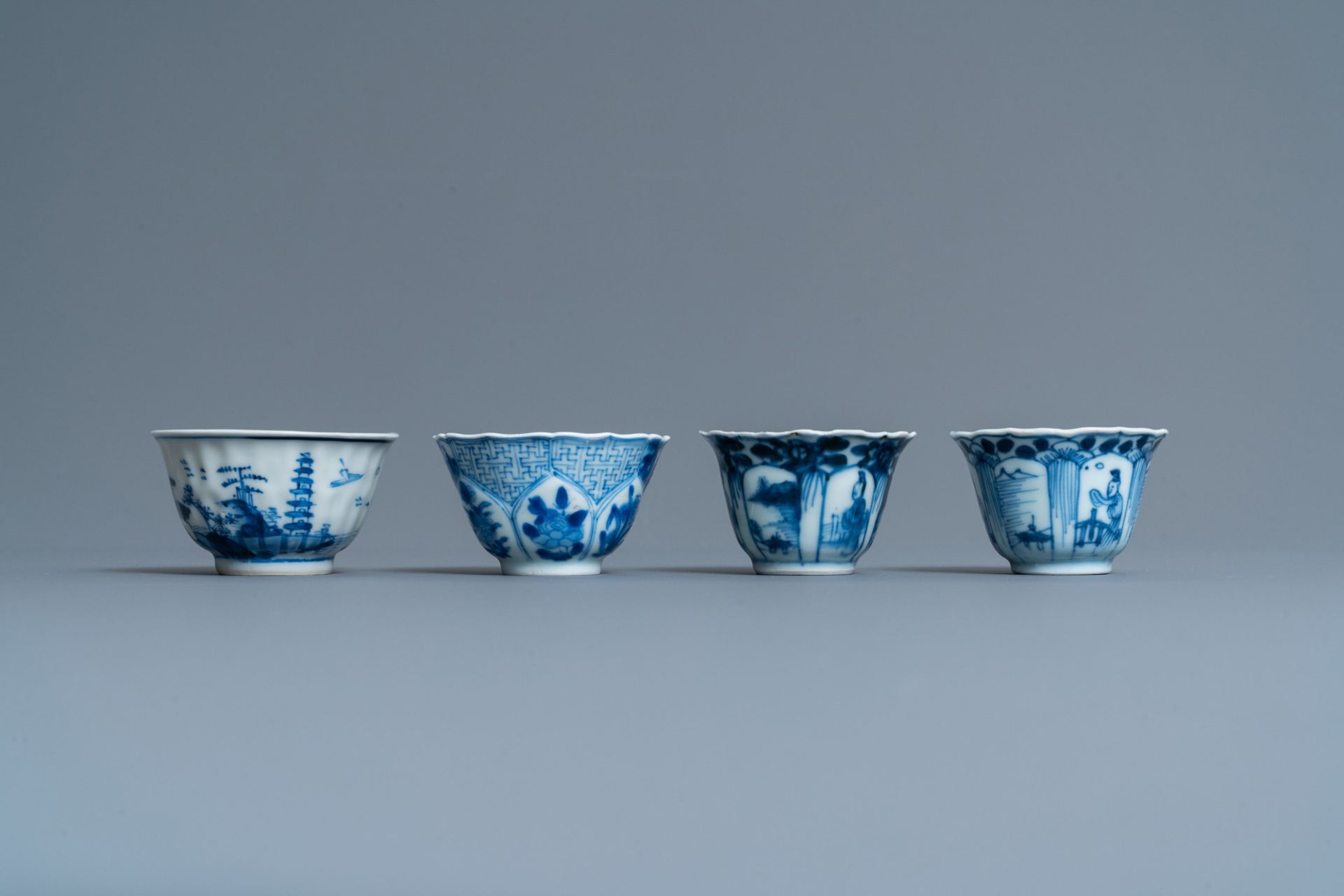 Twenty-one Chinese blue and white saucers and eighteen cups, Kangxi - Image 11 of 17