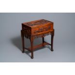 A Chinese wooden casket on stand, 19/20th C.