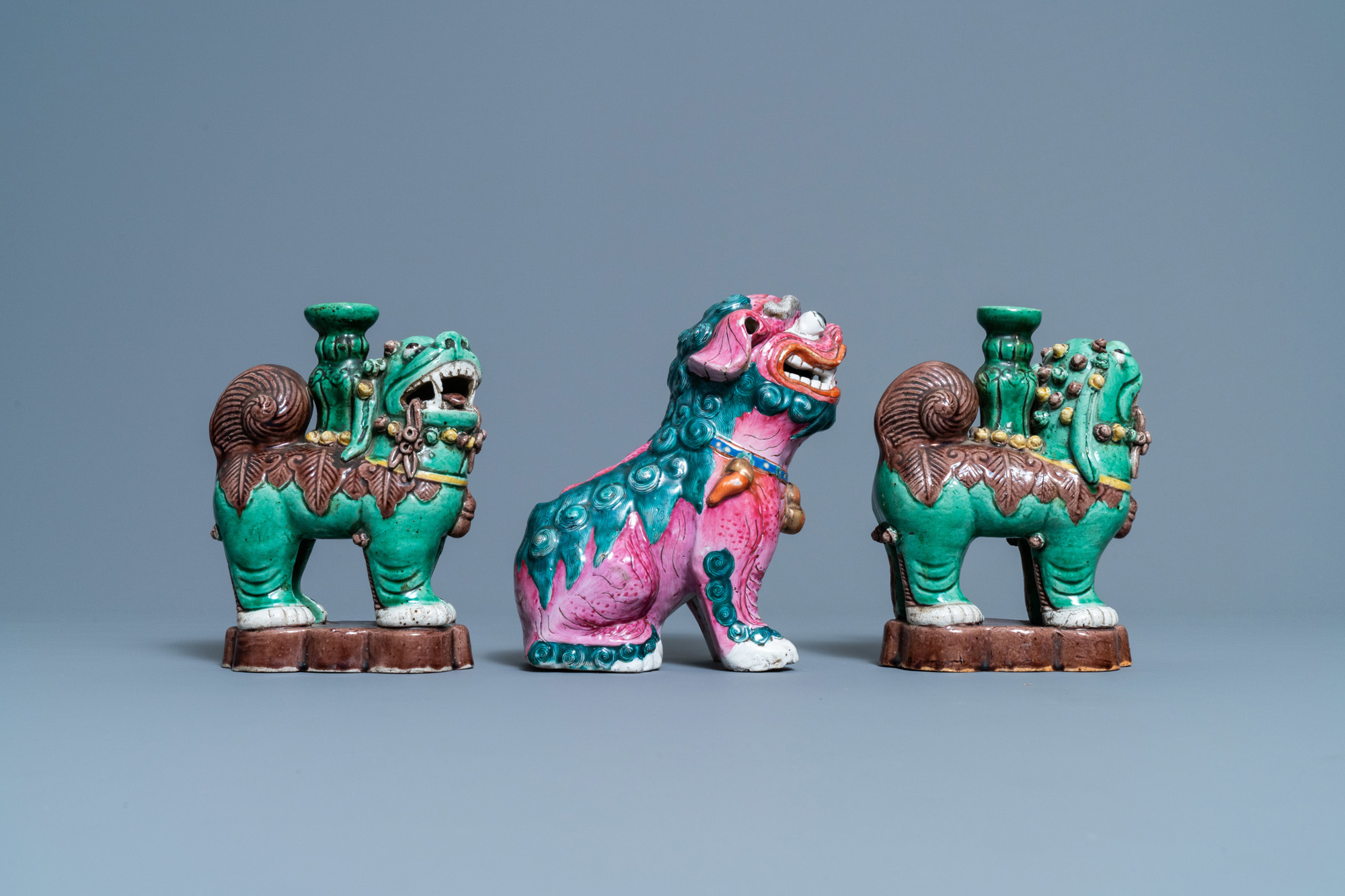 A Chinese famille rose model of a Buddhist lion and a pair of verte biscuit joss stick holders, 19th - Image 2 of 7