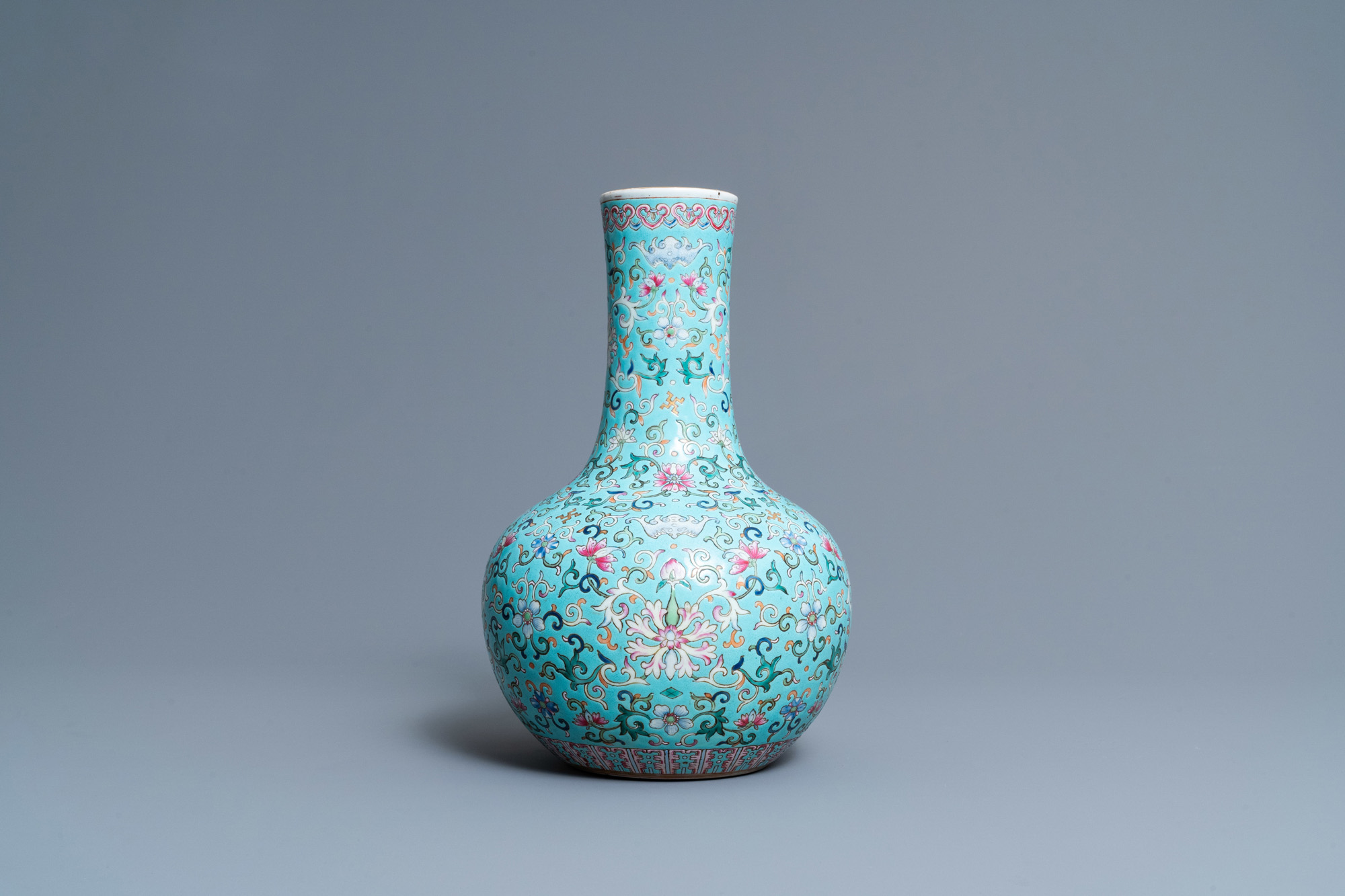 A Chinese famille rose turquoise-ground bottle vase, Qianlong mark, 19th C. - Image 2 of 6