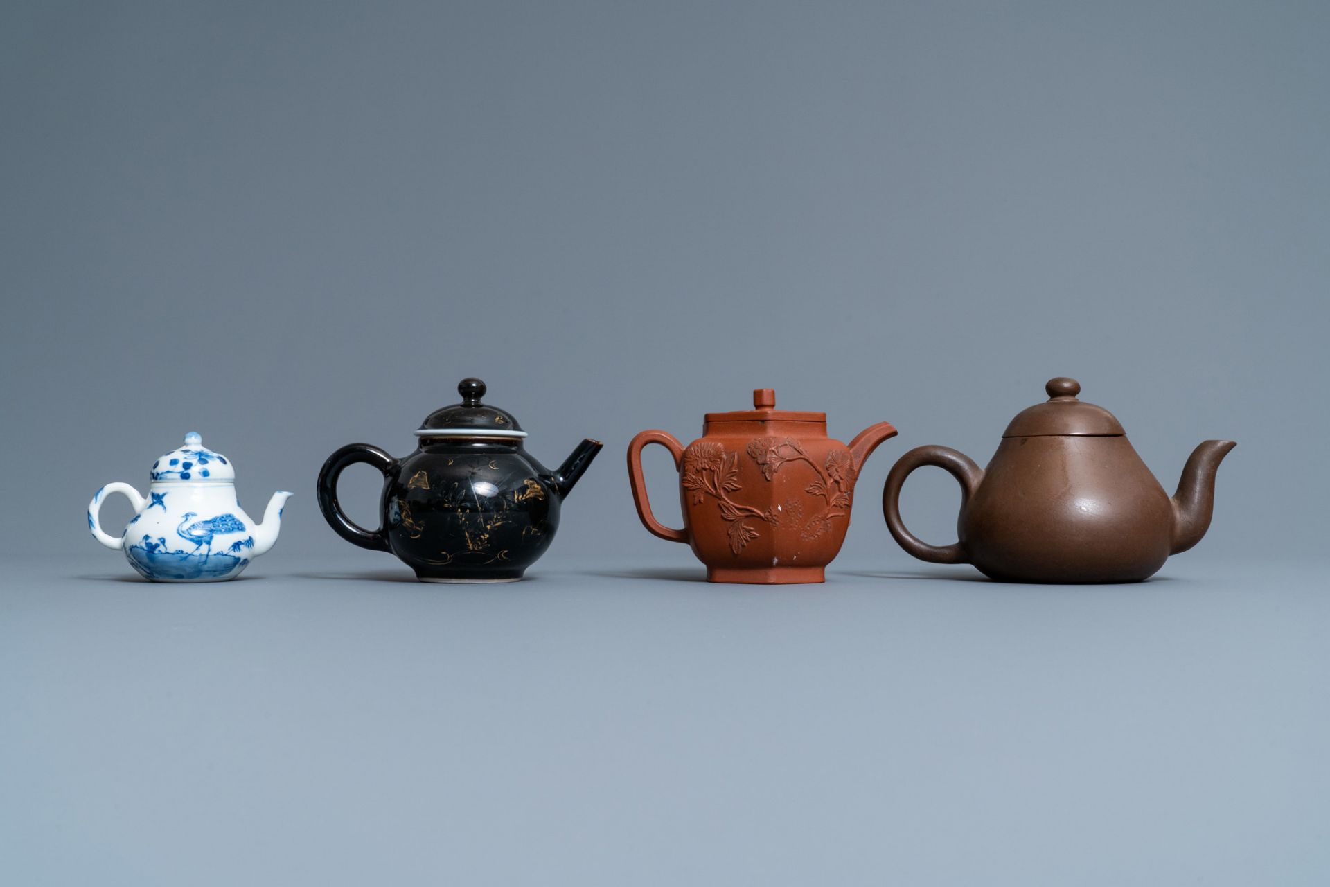 Four Chinese Yixing stoneware, blue and white and monochrome black porcelain teapots, Kangxi and lat - Image 4 of 9