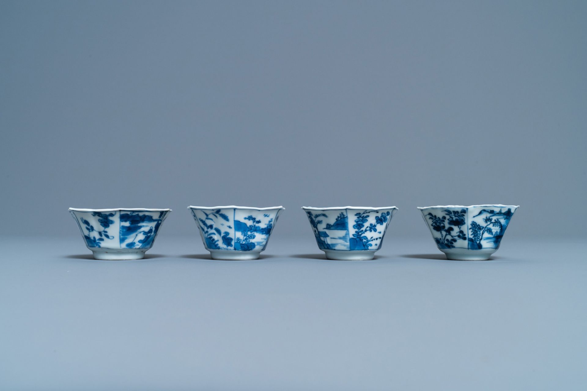 A pair of Chinese blue and white vases, a 'lotus' dish and four cups, Kangxi - Image 11 of 15