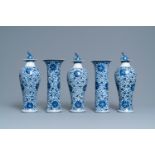 A Chinese blue and white five-piece garniture with floral design, 19th C.