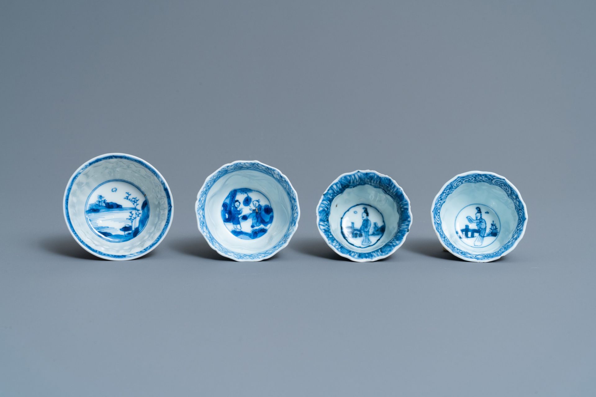 Twenty-one Chinese blue and white saucers and eighteen cups, Kangxi - Image 12 of 17
