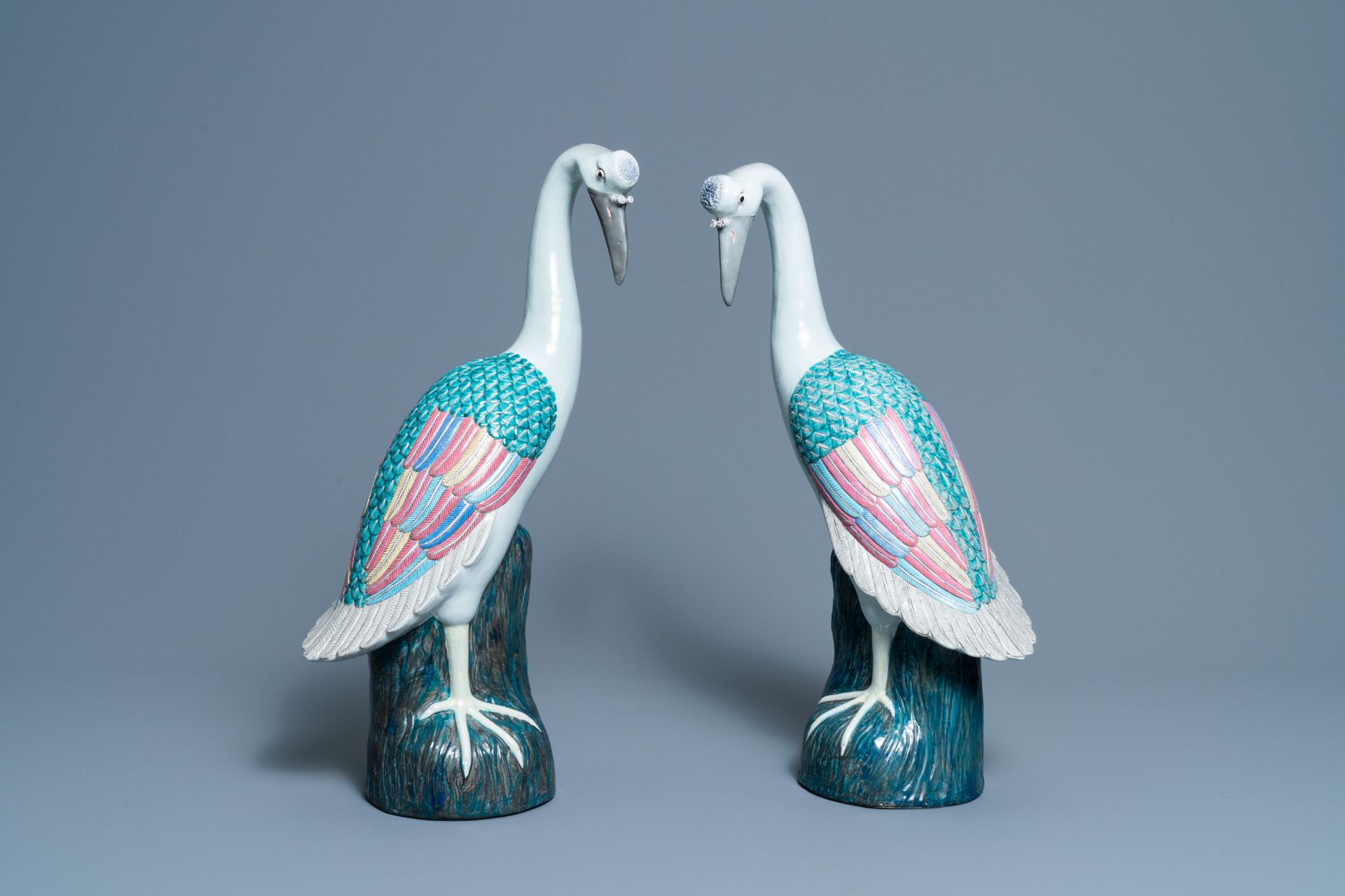 A pair of large Chinese famille rose models of cranes, 20th C.