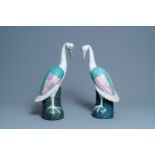 A pair of large Chinese famille rose models of cranes, 20th C.