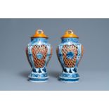 A pair of Japanese Arita blue and white reticulated vases, Edo, 17/18th C.