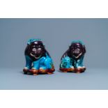 A pair of Chinese turquoise- and aubergine-glazed models of mythical animals, 19th C.