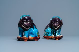 A pair of Chinese turquoise- and aubergine-glazed models of mythical animals, 19th C.