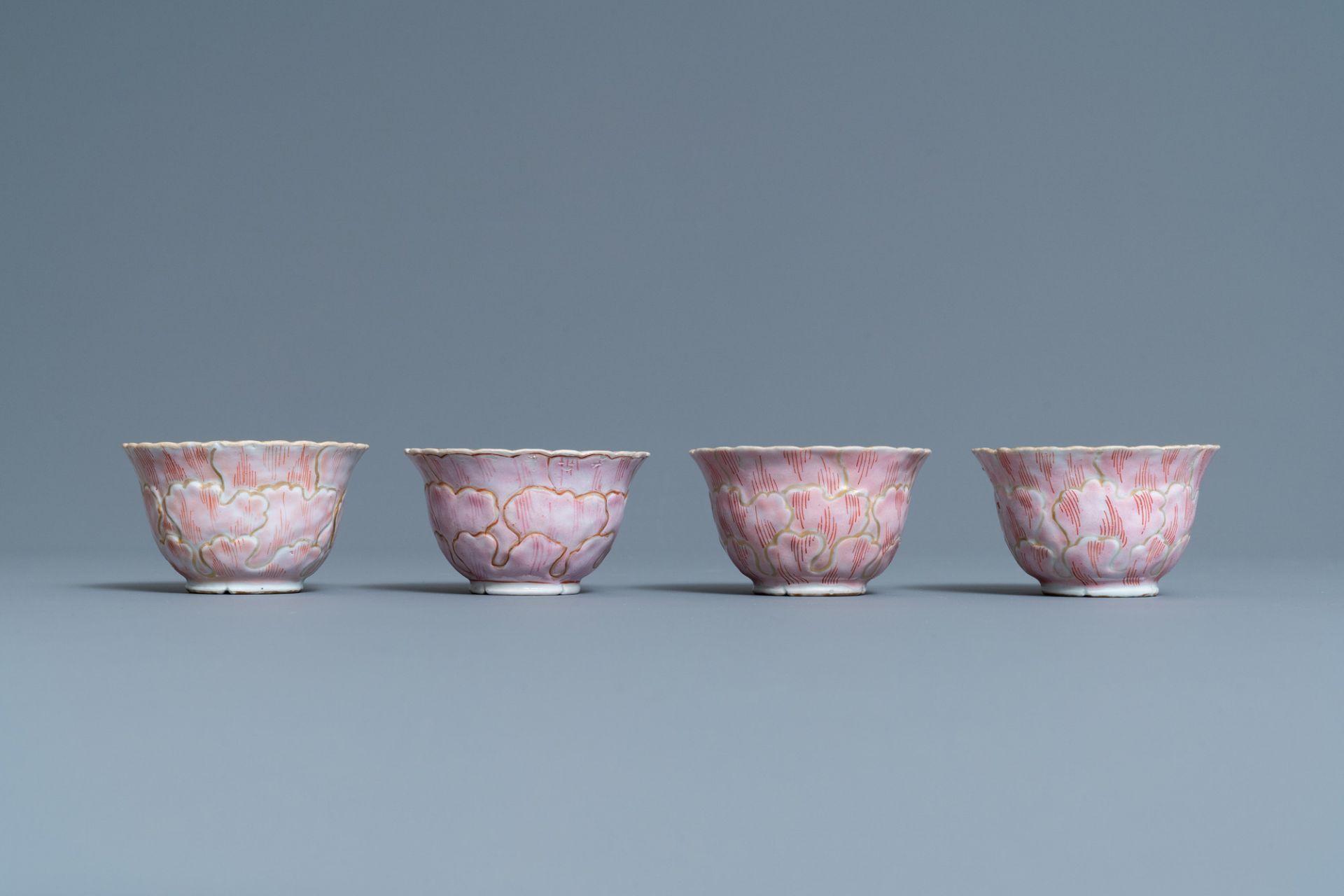 Four Chinese lotus-moulded famille rose cups and saucers with squirrels, Yongzheng - Image 5 of 9