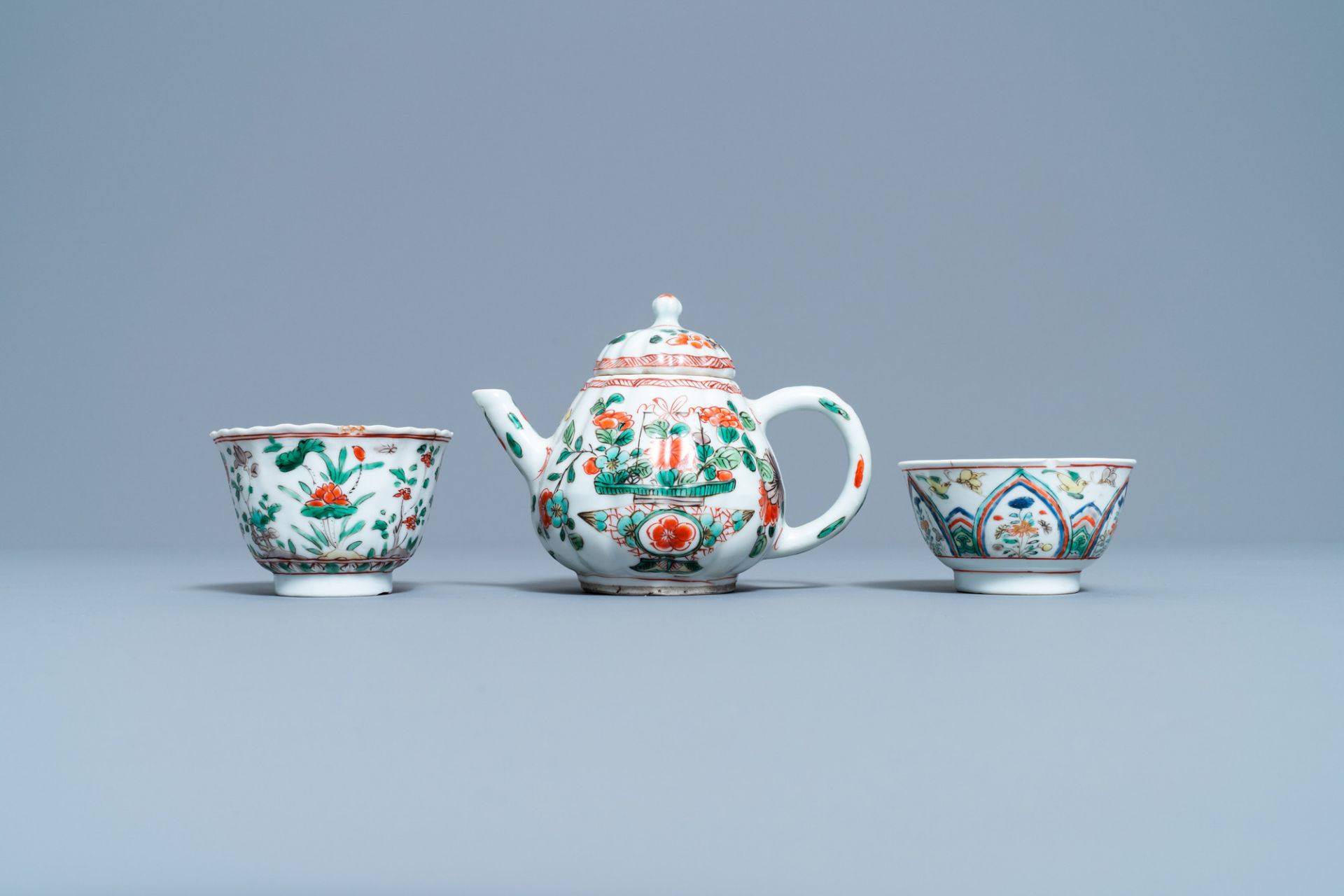 A Chinese famille verte teapot, two cups and three saucers, Kangxi - Image 7 of 10