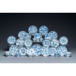 Twenty-three Chinese blue and white saucers and seventeen cups, Kangxi