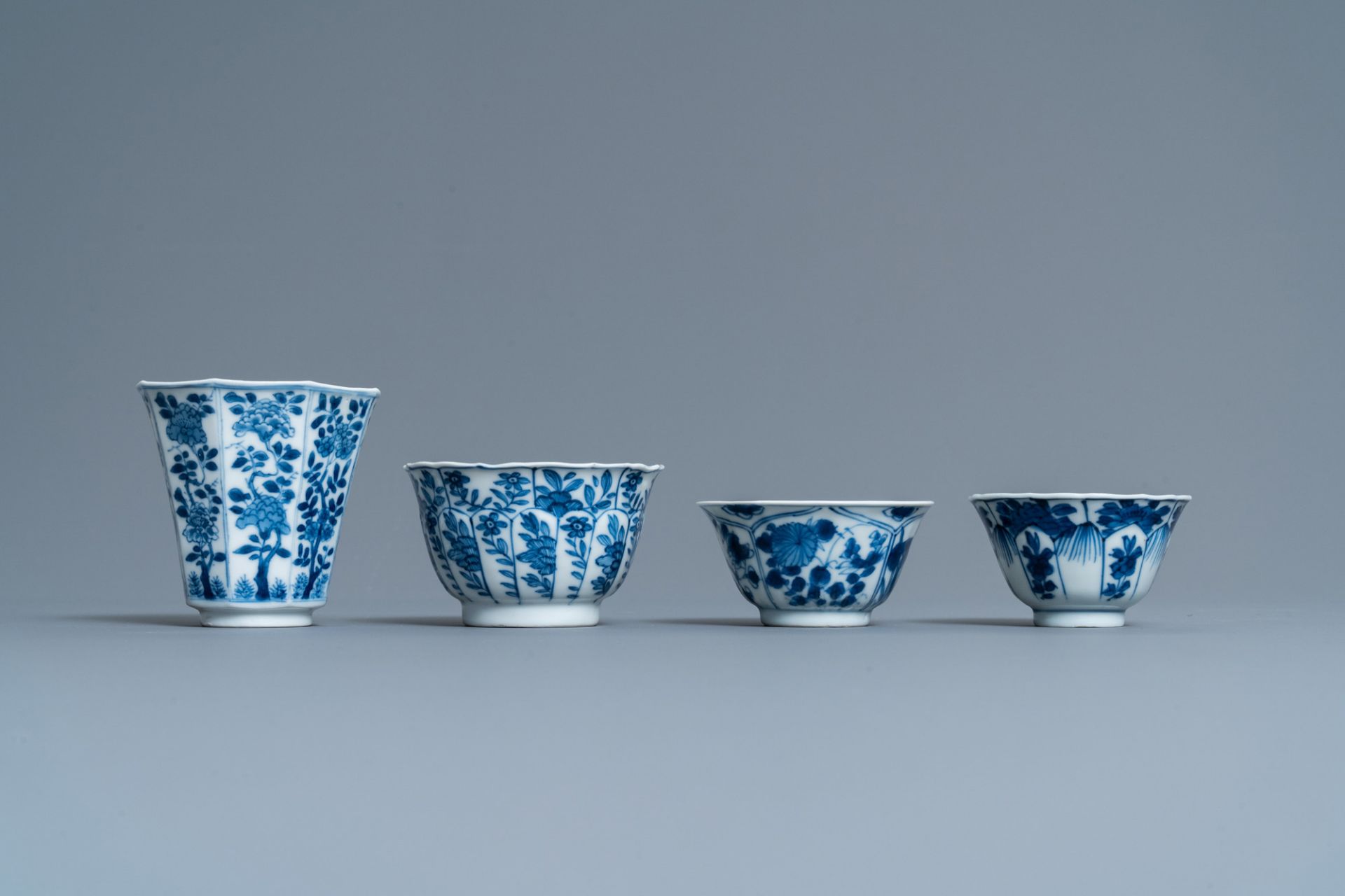 Twenty-one Chinese blue and white saucers and eighteen cups, Kangxi - Image 5 of 17