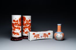 A Chinese famille rose 'playing boys' vase, a pair of hat stands and a head rest with Buddhist lions